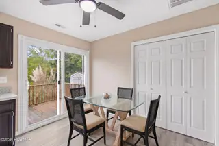 219 N Lake Keziah Drive, Southport, NC 28461 — 3-bedroom home in Boiling Spring Lakes, Southport, NC, photo 9 of 30: Photo 13 dining room AI