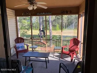 202 Country Club Villa Drive # 2, Shallotte, NC 28470 – photo 3: Screened Porch