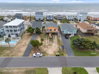 210 W Beach Drive, Oak Island, NC 28465 – photo 3: 3-web-or-mls-DJI_20250614135850_0268_D