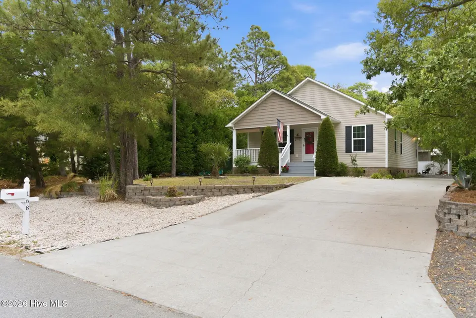 168 NE 3rd Street, Oak Island, NC 28465 – photo 1 of 38: 39-web-or-mls-dsc09807