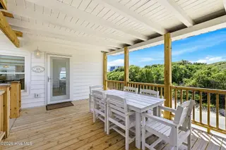3929 W Dolphin Drive, Oak Island, NC 28465 – photo 4: shniderproductions.com-38
