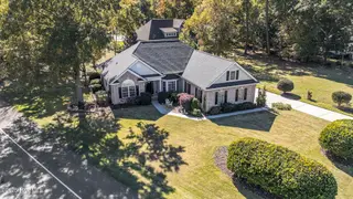 939 Oyster Pointe Drive, Sunset Beach, NC 28468 – photo 2: 004_dji_20251031124709_0115_d_533