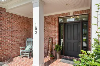 102 Reflection Court SW, Ocean Isle Beach, NC 28469 — 4-bedroom home in Ocean Ridge Plantation, Ocean Isle Beach, NC, photo 3 of 77: 005-20250822-100_a7409051_skyvue