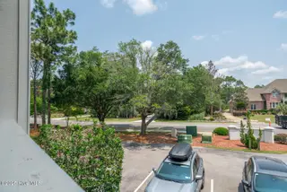 3350 Club Villas Drive 104, Southport, NC 28461 — 2-bedroom condo in St James, Southport, NC, photo 4 of 34: Front Porch View