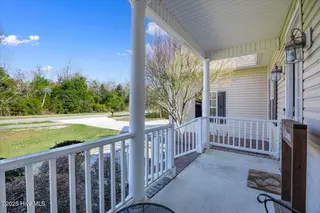 916 Sloop Point Loop Road, Hampstead, NC 28443 – photo 9: 09-FinalExteriorHampstead