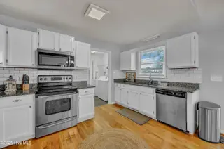 1004 E Oak Island Drive, Oak Island, NC 28465 – photo 11: 011_img_1086_446