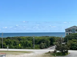 112 Oakleaf Drive 1003-A, Pine Knoll Shores, NC 28512 – photo 9: Ocean view from Front Balcony