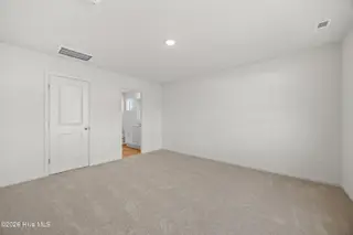 343 Glendale Arbor Drive SW 137, Ocean Isle Beach, NC 28469 – photo 7: Primary with bathroom