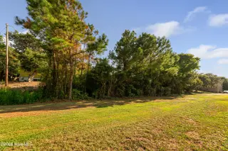 104 Juniper Road, Pine Knoll Shores, NC 28512 – photo 12: Vacant lot in Pine Knoll Shores