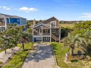 312 E Dolphin Drive, Oak Island, NC 28465 – photo 5: 5-web-or-mls-DJI_20250826170751_0116_D