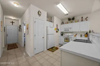916 Great Egret Circle SW # 3, Sunset Beach, NC 28468 – photo 7: 38-web-or-mls-IMG_2326
