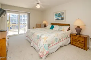 1131 S Shore Drive, Surf City, NC 28445 – photo 18: Streetside South King Bedroom