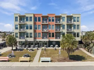 102 Cape Fear Boulevard Unit 301, Carolina Beach, NC 28428 — 1-bedroom condo in Towne Place Condominium, Carolina Beach, NC, photo 1 of 47: Exterior Picture