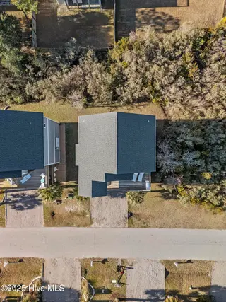 317 Oceanaire Lane, Surf City, NC 28445 – photo 10: DJI_20250114100034_0315_D