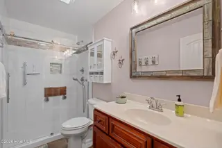 208 NE 52nd Street, Oak Island, NC 28465 – photo 18: 23-web-or-mls-DSC04365