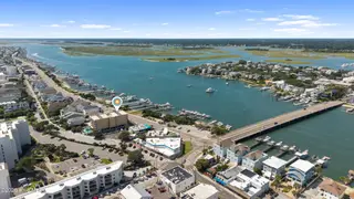104 S Lumina Avenue S 203, Wrightsville Beach, NC 28480 — 1-bedroom condo in Summer Sands Condominiums, Wrightsville Beach, NC, photo 2 of 27: DJI_20260921125543_0023_D