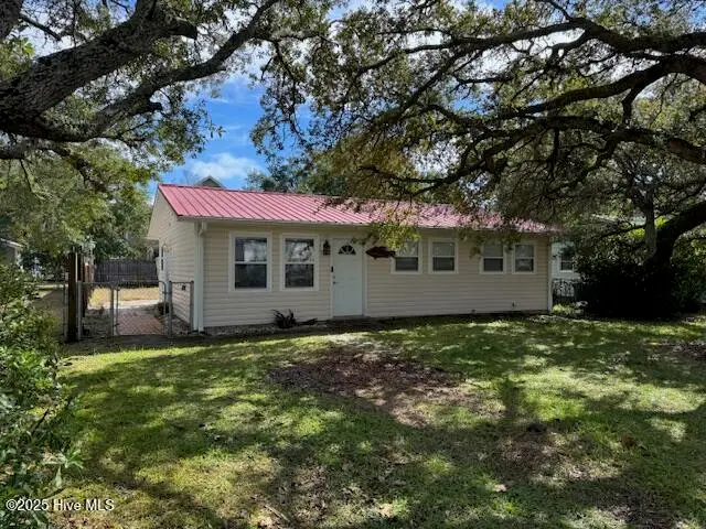 214 NE 54th Street, Oak Island, NC 28465 – photo 1 of 22: Main House