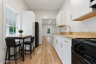 316 E Walter Street, Whiteville, NC 28472 – photo 18: Virtually Staged Kitchen Breakfast Nook