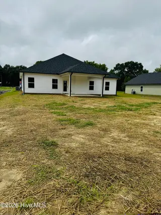 409 S Carey Street Lot 66, La Grange, NC 28551 – photo 15: backyard with covered patio