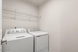 8035 Sterling Oak Drive NW, Ash, NC 28420 – photo 17: Laundry