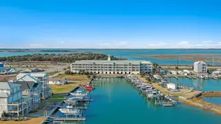 212 Old Causeway Road 107 & B13 Slip, Beaufort, NC 28516 — 3-bedroom condo in Morgan Creek Landing, Beaufort, NC, photo 1 of 49: Morgan Creek Landings 107