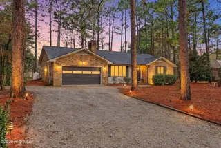 5 Birdie Drive, Whispering Pines, NC 28327 – photo 2: 5 Birdie Drive-1 Twilight