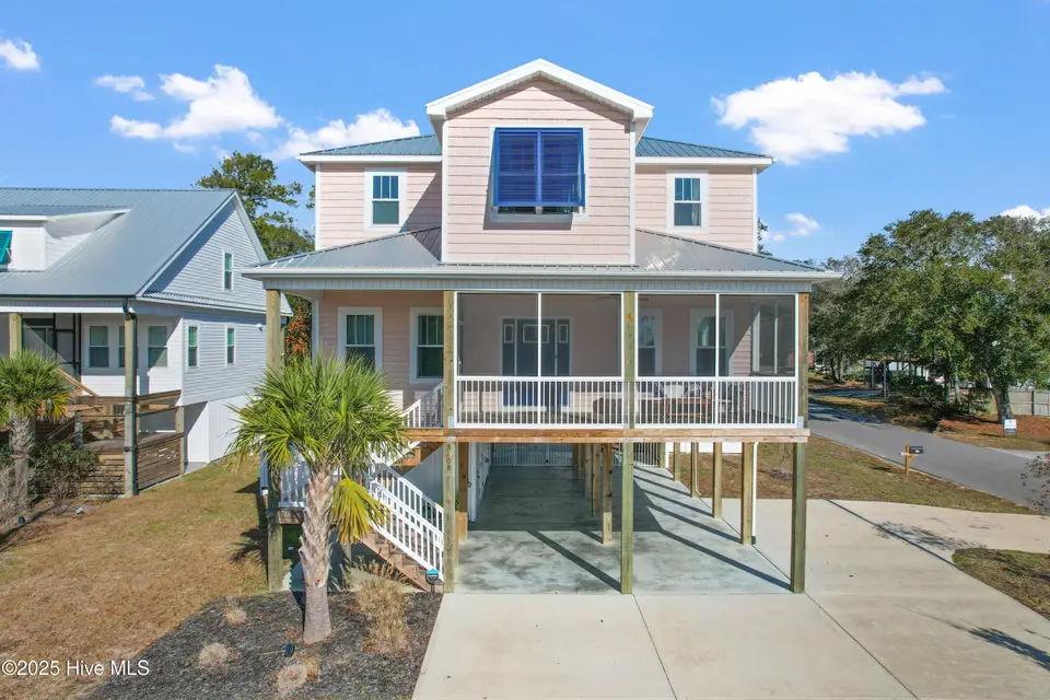 3108 E Oak Island Drive, Oak Island, NC 28465 – photo 1 of 73: 3108EOakIslandDr - 2 (1)