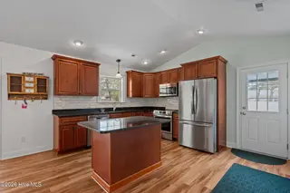 208 NE 52nd Street, Oak Island, NC 28465 – photo 13: 35-web-or-mls-DSC04401