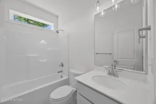 4503 Village Green Drive SW Homesite 91, Shallotte, NC 28470 — 3-bedroom home in Village Green SHLTE, Shallotte, NC, photo 10 of 49: 9_bathroom