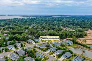 226 Sand Dollar Lane, Southport, NC 28461 – photo 3: 226 Sand Dollar Lane drone-02