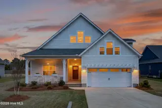 6923 Campbells Ridge Drive SE, Leland, NC 28451 – photo 1: 6923CampbellsRidgeDrSE_Front_Dusk_02