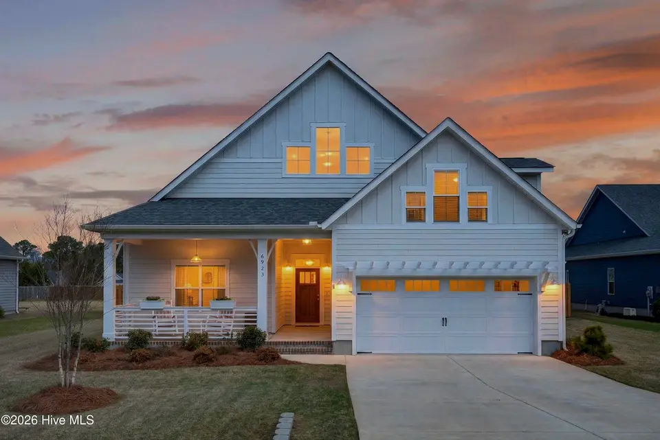 6923 Campbells Ridge Drive SE, Leland, NC 28451 – photo 1 of 64: 6923CampbellsRidgeDrSE_Front_Dusk_02