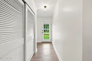 216 Carolina Pines Boulevard, New Bern, NC 28560 – photo 6: Coat Closet For Storage Front Entryway