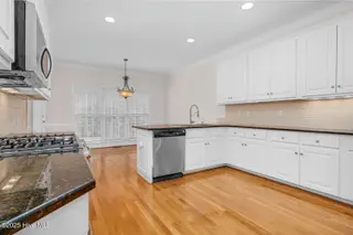 1119 Falling River Walk, Rocky Mount, NC 27804 — 4-bedroom home in River Falls, Rocky Mount, NC, photo 15 of 51: Bright Breakfast Nook, Hardwood