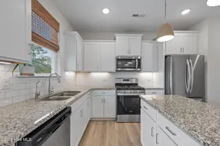 910 Terraces Lane, Hampstead, NC 28443 – photo 14: 35-web-or-mls-_RAD6903