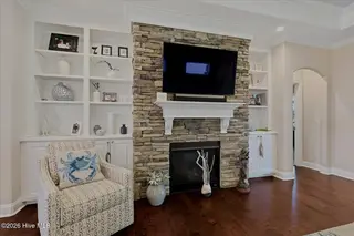 8309 Oak Abbey Trail NE, Leland, NC 28451 — 3-bedroom home in Compass Pointe, Leland, NC, photo 21 of 66: Stacked Stone Fireplace