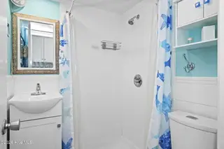 1918 W Fort Macon Road 241, Atlantic Beach, NC 28512 – photo 12: 9-web-or-mls-1-BogueShores-U241-8-21-26-