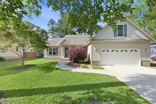 1007 Barkentine Drive, New Bern, NC 28560 – photo 1: Home on Golf Course Lake