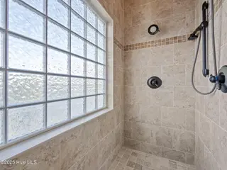 6414 Ocean Drive, Emerald Isle, NC 28594 – photo 23: Master bathroom walk in shower