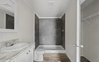 6823 Lewis Drive SE, Winnabow, NC 28479 – photo 17: Master bathroom