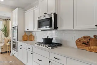 3355 Grand Park Way, Leland, NC 28451 – photo 12: Kitchen Range - Yates II B - Foxhall Lan