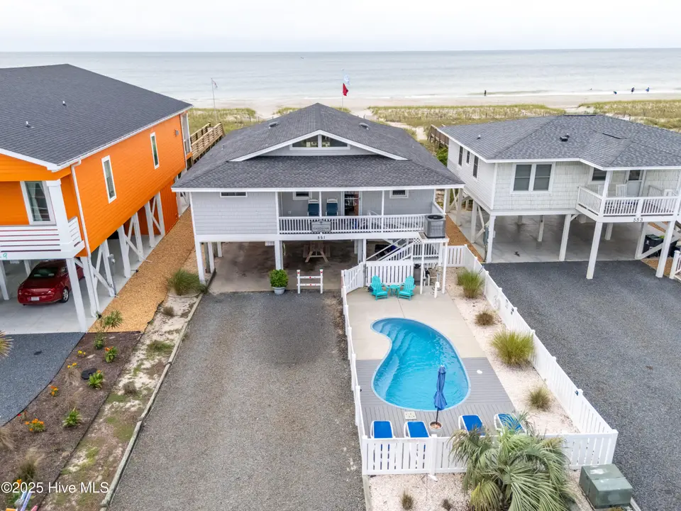 551 Ocean Boulevard W, Holden Beach, NC 28462 – photo 1 of 42: DJI_20250913122259_0001_D-HDR 2