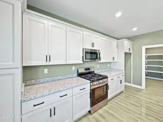 2111 Staysail Drive, Elizabeth City, NC 27909 – photo 12: 00b46f4dc8cc00ca95e0a69c446db48f08c01e39
