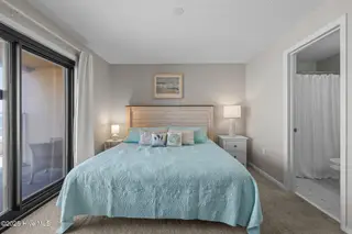 1505 Salter Path Road 409, Indian Beach, NC 28512 – photo 20: Master with Sliding door to Balcony
