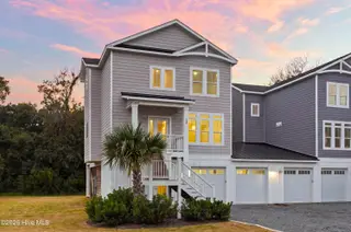52 Pier View Court, Hampstead, NC 28443 — 3-bedroom waterfront home, Hampstead, NC, photo 6 of 60: 3_front left exterior sunset