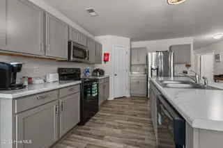 737 Landmark Cove, Carolina Shores, NC 28467 — 4-bedroom home in Landmark at Lighthouse Cove, Carolina Shores, NC, photo 14 of 39: Kitchen
