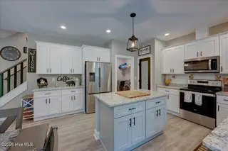 209 Pecan Grove Court, New Bern, NC 28562 – photo 9: Kitchen Featuring a Center Island