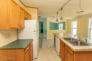 423 Gray Drive SW, Shallotte, NC 28470 — 3-bedroom manufactured home in Sherrow Estates, Shallotte, NC, photo 9 of 38