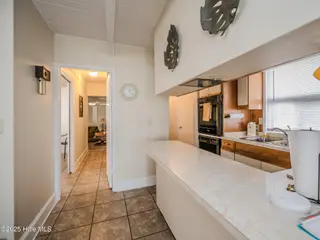 3002 Canal Cove Road, Lake Waccamaw, NC 28450 – photo 16: Kitchen-Hallway