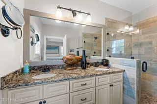 1404 W Yacht Drive, Oak Island, NC 28465 – photo 13: Primary en-suite